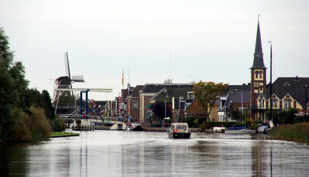 De Rakken Villa Woudsend Eksteriør billede